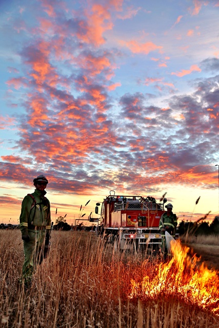 Image of firefighters at sunset by Paul Hitch